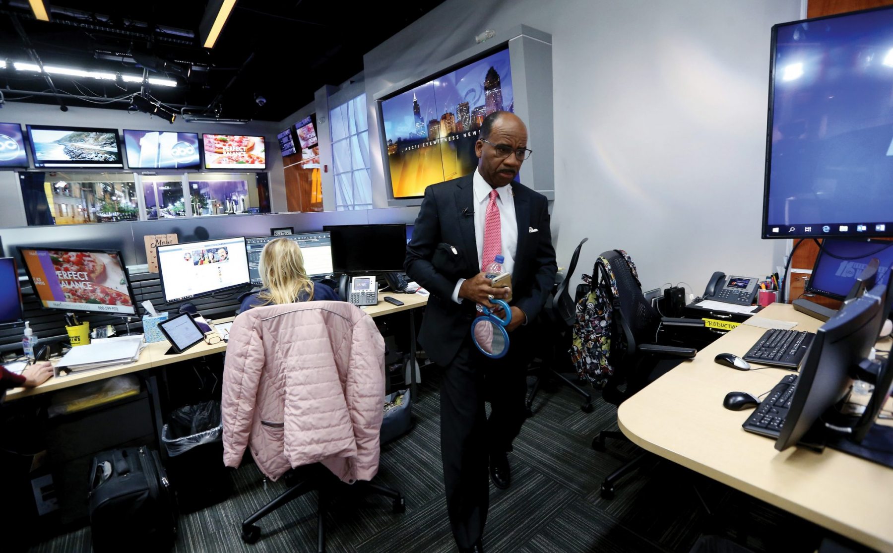 Co-anchor John Clark heads to the news desk just before the noon broadcast in the ABC11 Eyewitness newsroom. January 15, 2020. Raleigh, NC